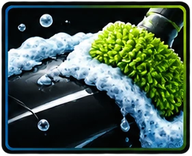 Foam wash mitt on a car hood during the prep and decontamination wash