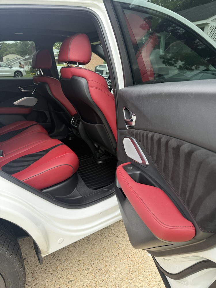 Interior refresh: Seats, door panels, and carpets kept spotless (Clean Company Detailing)